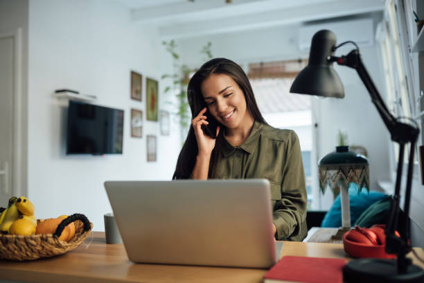 istock Attractive young woman working from home 1223054048