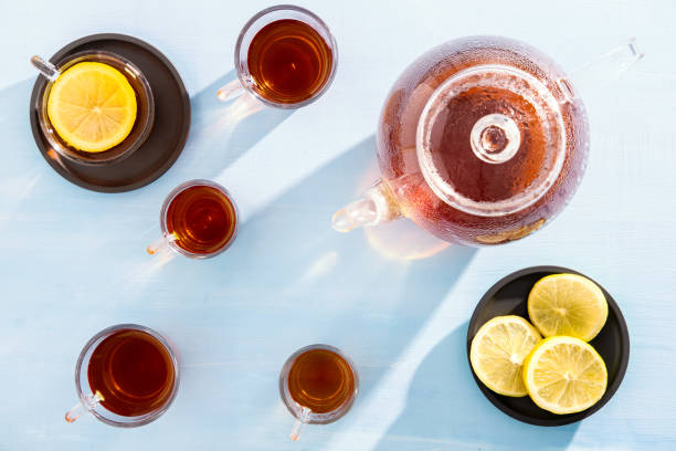 istock Glass teapot and cups in the sunlight 1223054936
