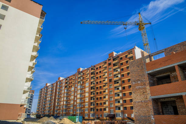 istock living building construction process urbanization concept industrial yard area with high crane working object modern city rustic architecture exterior facade 1223055352