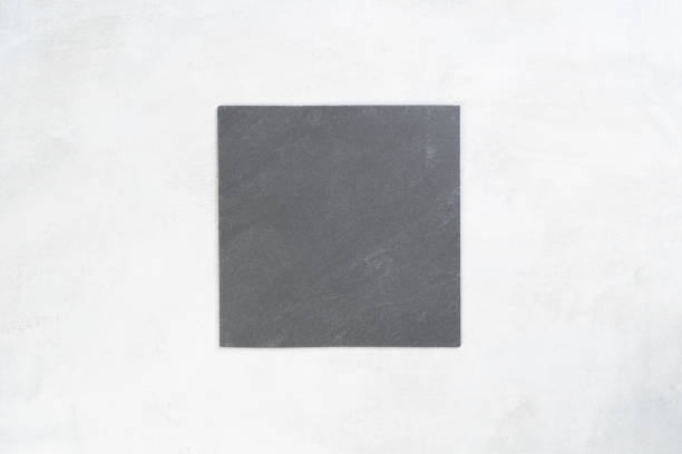 istock Gray slate board light over cement texture background with copy space. Free space for menu or recipes. Cooking or food background, Top view. 1223056211