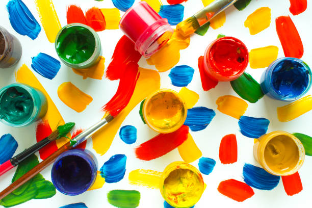 istock Jars of paint and multicolored strokes 1223056458