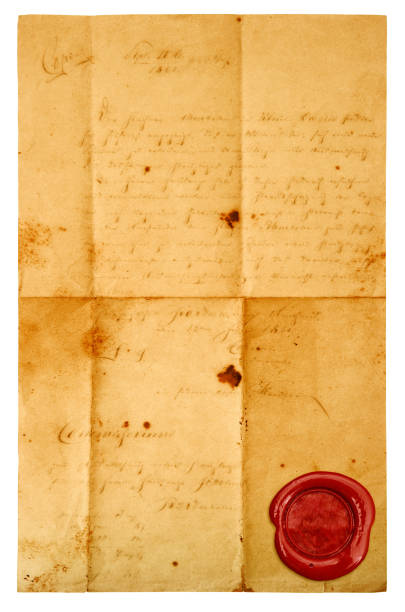 istock Used letter paper sheet red wax seal isolated white background 1223056576