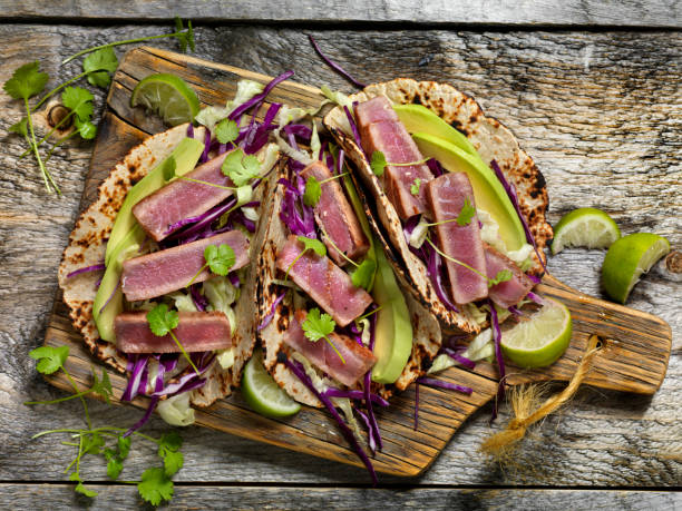 seared ahi tuna tacos and a beer - tuna tuna steak raw freshness imagens e fotografias de stock