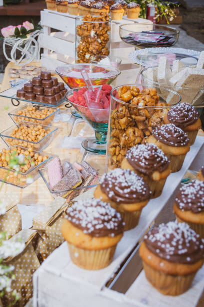 istock Cup cake, cupcake, pancake or cupcake with chocolate topping at candy table at social event 1223056817