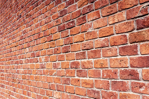 Pattern of brick glass window building in Brooklyn, NYC, New York City, front exterior grunge old architecture