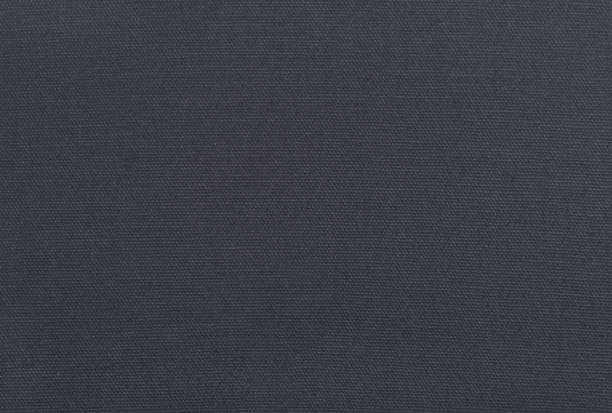 istock Natural linen texture background with delicate grid , dark grey black canvas texture background 1223060887