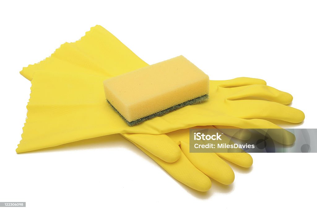 Rubber Gloves and Sponge Photograph of rubber Gloves and a sponge shot in studio and isolated on a white background Bath Sponge Stock Photo