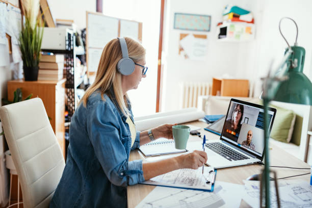 istock Successful employee having online video call with colleagues 1223060989