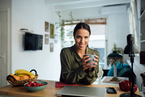 istock Beautiful young woman working from home 1223061929