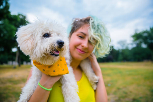 istock Young woman enjoying with her dog 1223061991