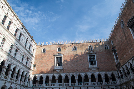 Venice, Italy - May 21, 2018. Architectural details of Doge's Palace at Saint Mark's Square, Venice, Italy.