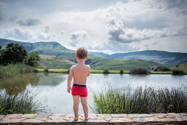 istock Young boy looking at the horizon 1223063933