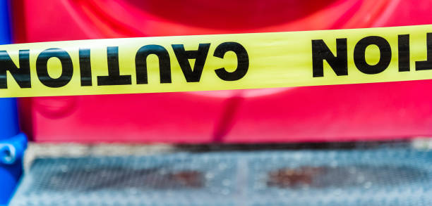 istock Close up of caution tape. 1223065636