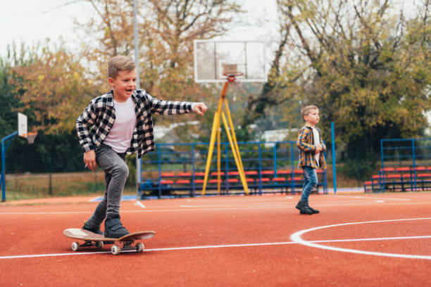 istock Little boy playing on skateboard stock photo 1223067934