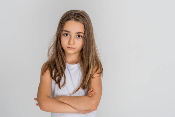 Sad little girl portrait isolated