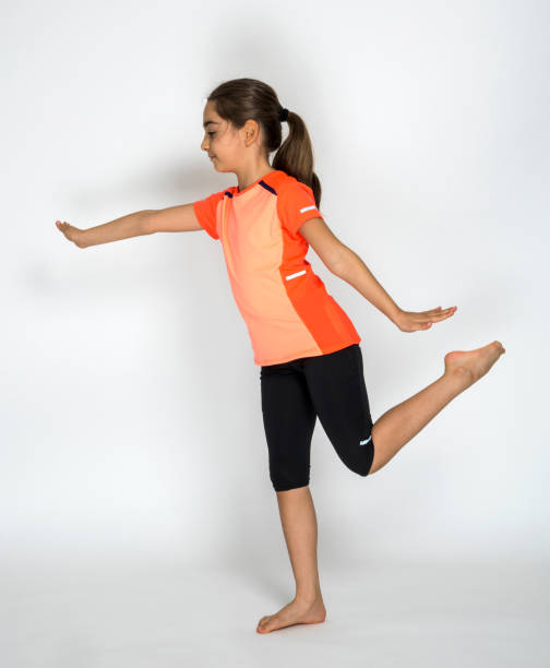 istock Fit Slim Woman Practicing Yoga 1223068118