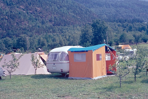 Upper Austria, Austria, 1962. Caravan and tent on a campsite.