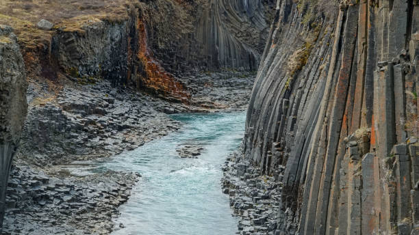 istock Studlagil basalt canyon with volcanic basalt columns, Iceland 1223076393