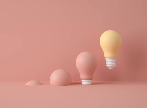 istock 3D Illustration. Row of light bulbs with one of different colour. 1223078579