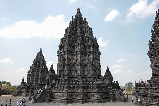 Central Java, Indonesia - November 1 - 2015 : Tourists visiting complex of Prambanan Hindu temple in Klaten, Central Java. \nThis temple is a UNESCO World Heritage Site.
