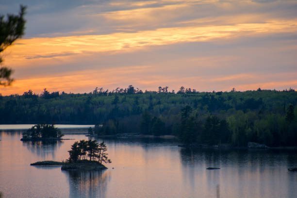 istock Vibrant sunset overlooking a lake with islands 1223088101