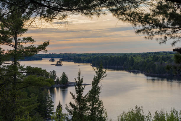 istock Vibrant sunset overlooking a lake with islands 1223088155