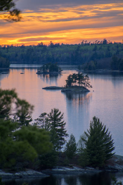 istock Vibrant sunset overlooking a lake with islands 1223088157