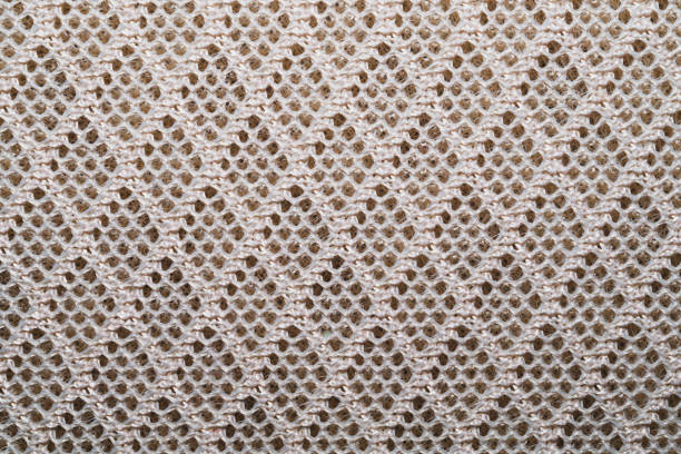 Knitted fabric close up texture. woven material. textile background