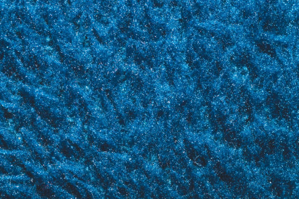 istock Soft fabric texture. blue textile with curly fibers. wool background 1223092290