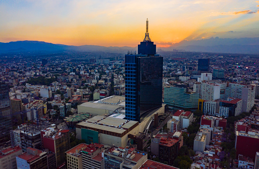 Panoramic aerial view of the iconic World Trade Center building in Mexico City on a day with a beautiful sunset