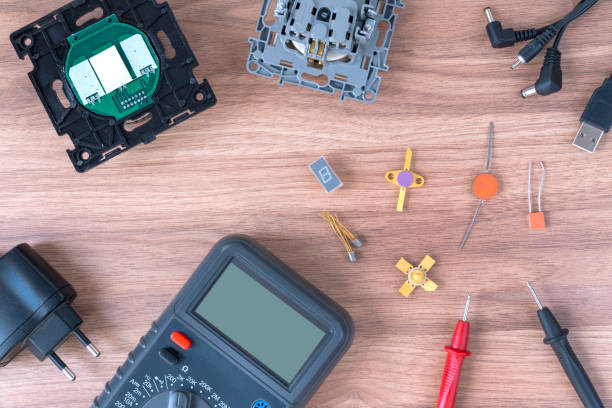istock Multimeter and power supply cables. conducting tests and electrical measurements. electronics repair. concept World Amateur Radio Day. flat layout, copy space 1223099955