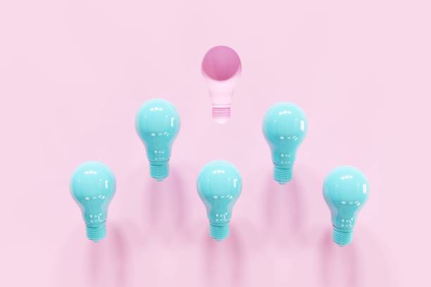 istock Outstanding Pink Light bulb slump leadership with blue light bulbs on pink background. 3D Render. Minimal Creative idea. 1223101914