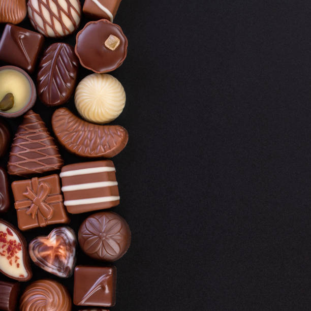 istock chocolate candies on blackboard background, various pralines and truffles with empty space 1223104244