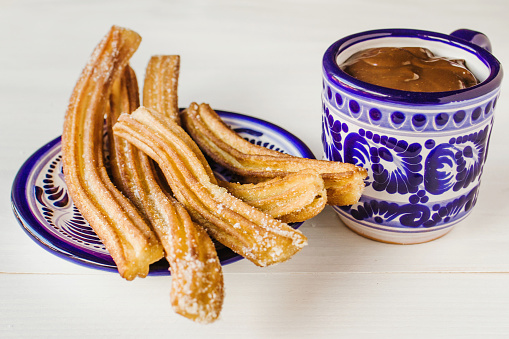 Churros with a side of Chocolate Sauce