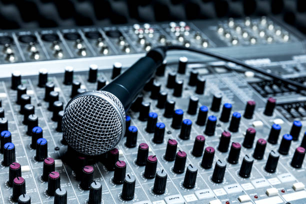 istock Professional condenser studio microphone, Musical Concept. recording, selective focus  microphone in radio studio, selective focus microphone and blur musical equipment, 1223114256