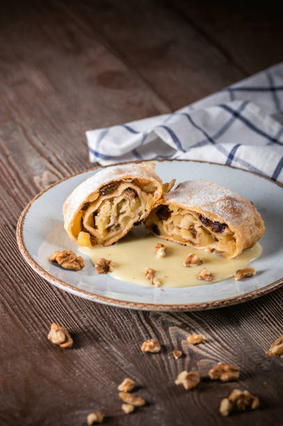 istock Traditional piece of apple strudel with powdered sugar 1223115994