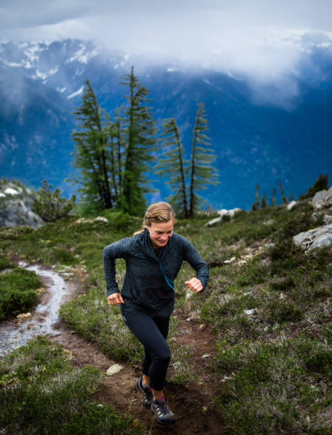 istock Healthy woman mountain trail running 1223120843
