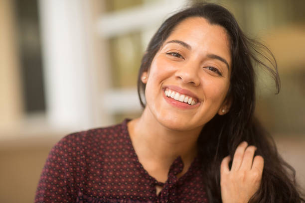 istock Young Hispanic woman smiling. 1223121017