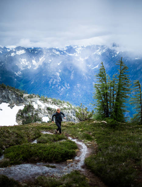 istock Healthy woman mountain trail running 1223121326
