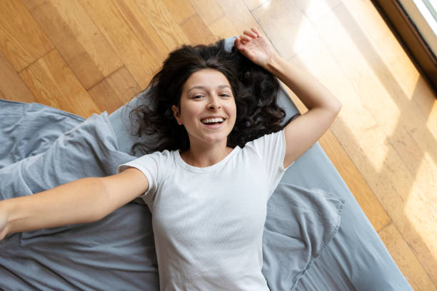 istock Beautiful young brunette girl takes a selfie. View from above. Good mood 1223123473