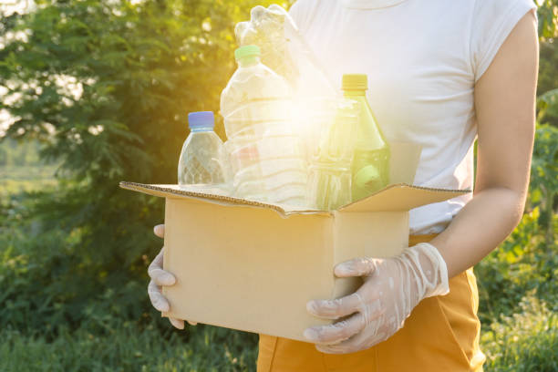 istock plastic bottles into a box for recycling concept 1223124317