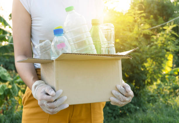 istock plastic bottles into a box for recycling concept 1223124330