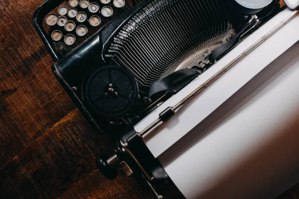 istock Typewriter vintage retro styled on the wood table 1223127653