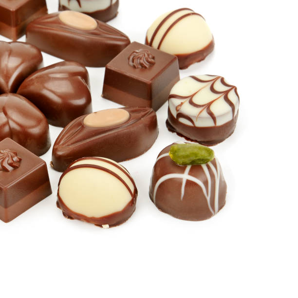 istock Various chocolate pralines isolated on white background. 1223128086