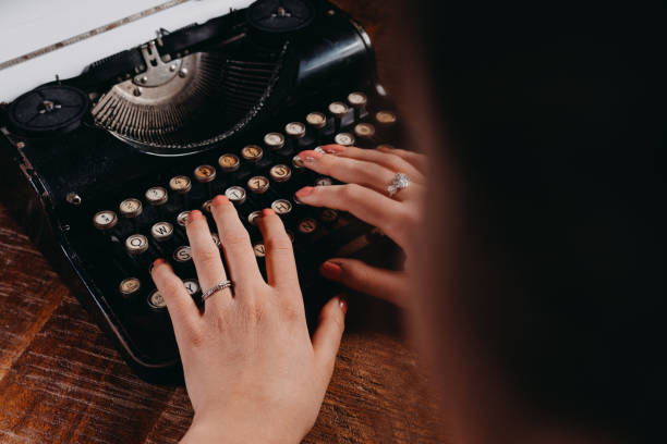 istock Typewriter vintage retro styled on the wood table 1223129066