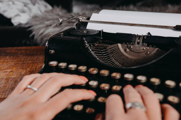 istock Typewriter vintage retro styled on the wood table 1223129418