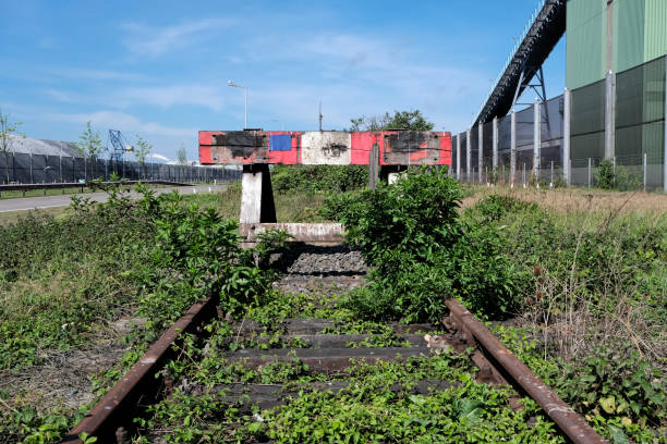 istock wooden buffer stop with red stop sign ending rail tracks concept for limit. Buffer stop . The final line 1223130780