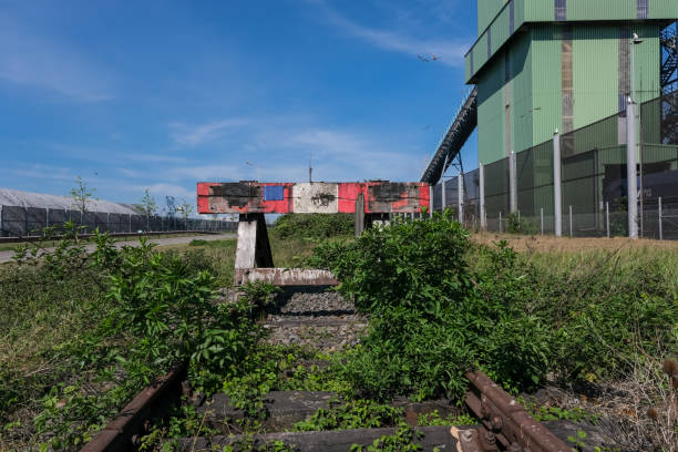 istock wooden buffer stop with red stop sign ending rail tracks concept for limit. Buffer stop . The final line 1223130791
