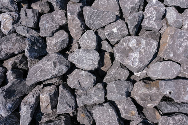 istock Sea stones background. Natural stone texture, rock wallpaper, background wall 1223130792