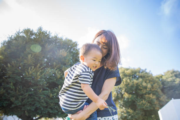 istock boy and mom at park 1223130991